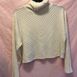 Cream cropped turtleneck sweater